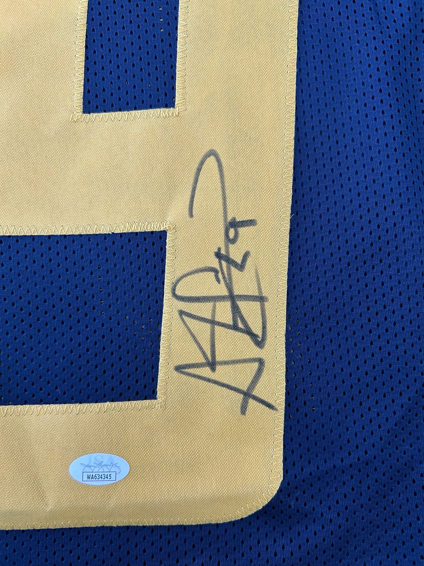 ADAM “PAC-MAN” JONES SIGNED NCAA STYLE JERSEY
